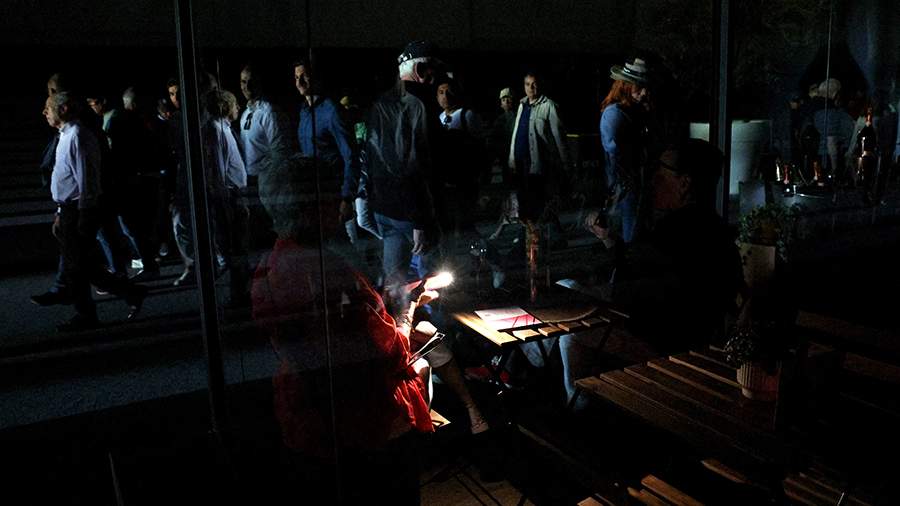 Emergency workers assisting residents during a major power outage in Spain